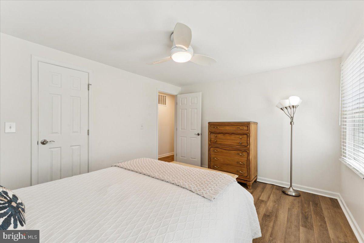 1377 Rock Chapel Road Herndon, VA 20170 - Photo 37 of 65 a bedroom with a bed and a dresser