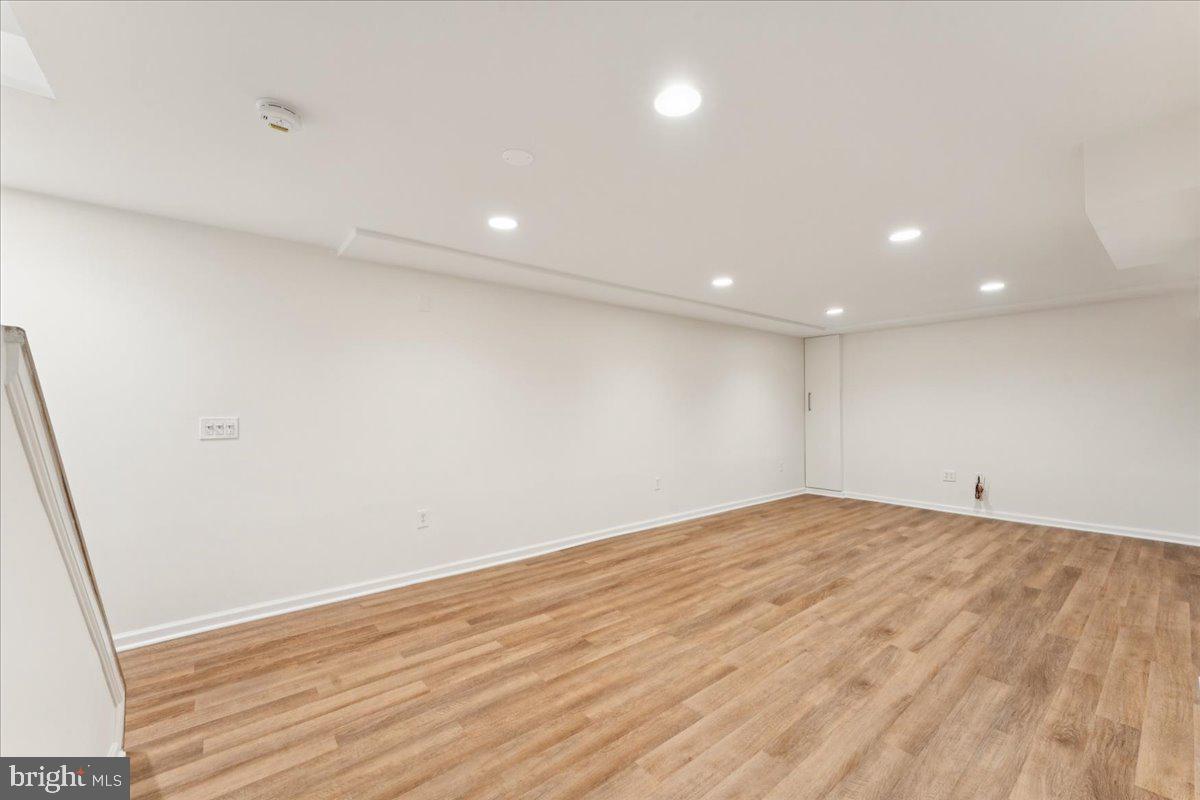 1377 Rock Chapel Road Herndon, VA 20170 - Photo 42 of 65 a view of empty room with wooden floor