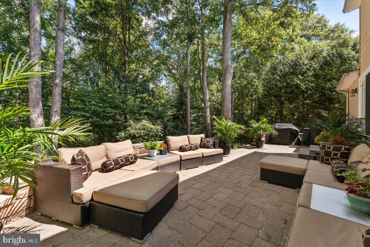 1377 Rock Chapel Road Herndon, VA 20170 - Photo 48 of 65 a view of patio with couches and a fire pit