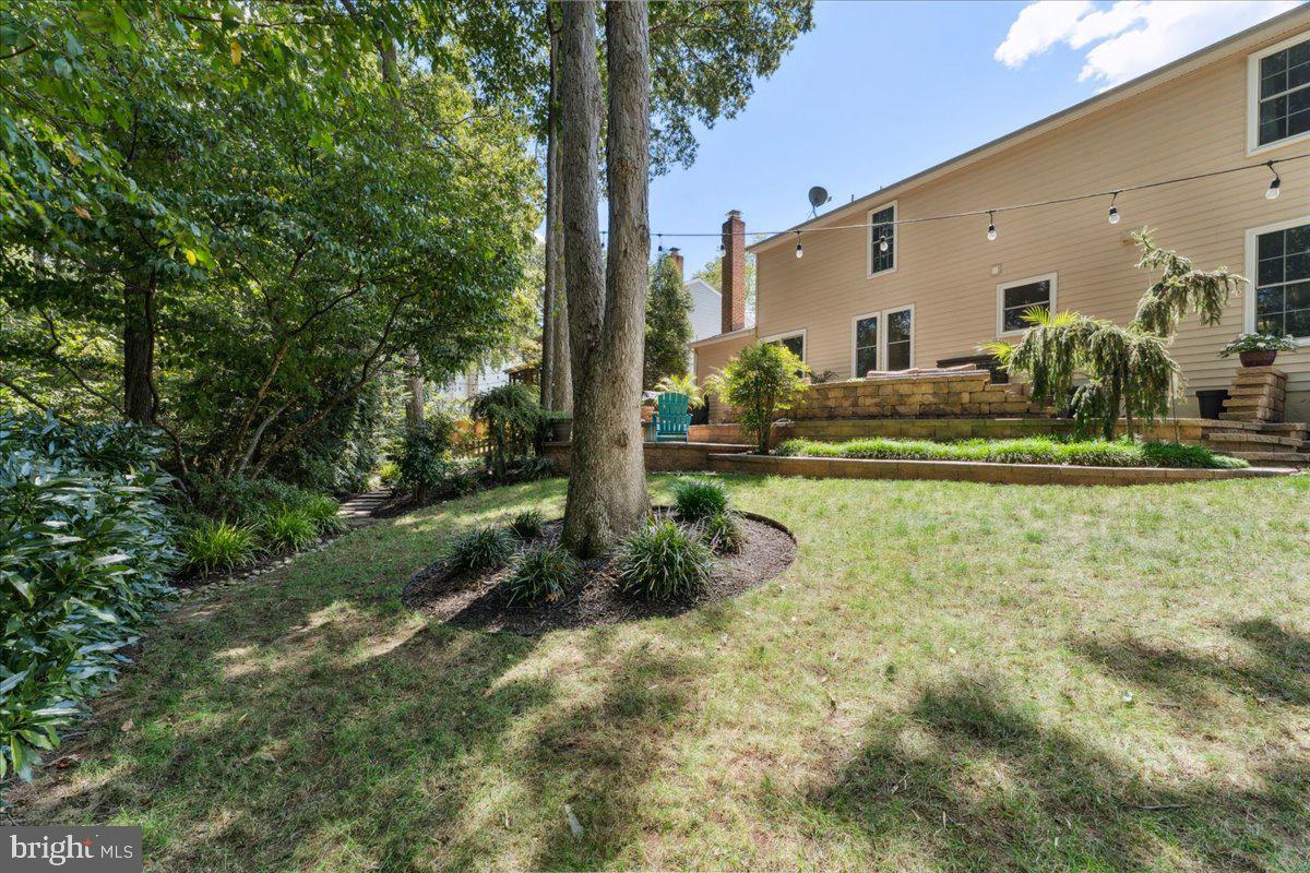 1377 Rock Chapel Road Herndon, VA 20170 - Photo 56 of 65 a view of backyard of house with green space