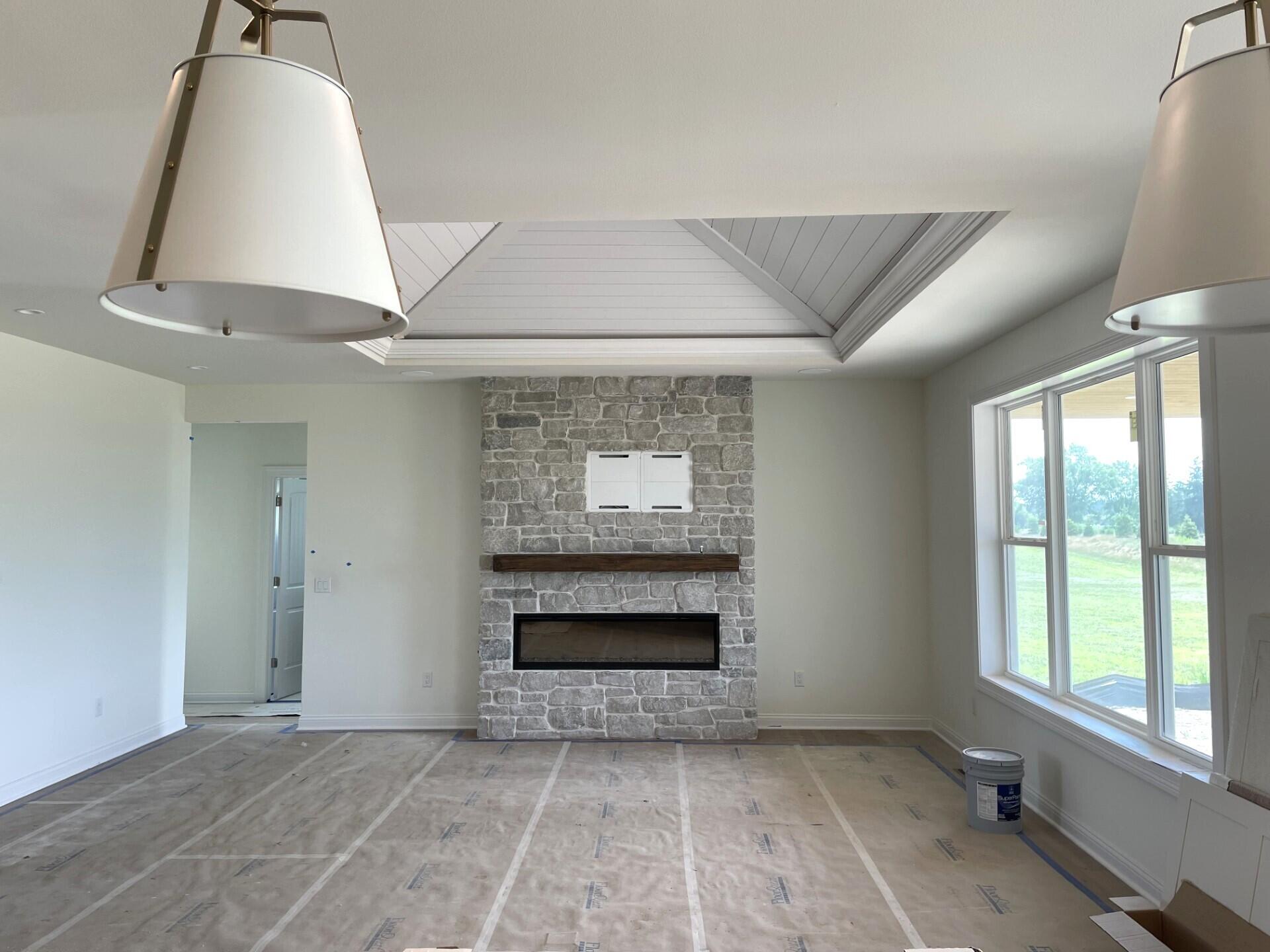 W358-n6309 W358-n6309 Ennis Road Oconomowoc, WI 53066 - Photo 16 of 47 View into Great Room
