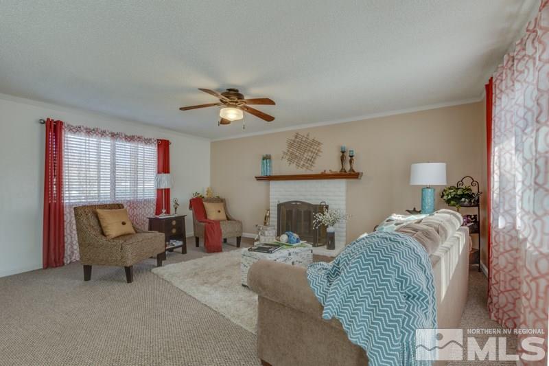 1830 Prior Road Reno, NV 89503 - Photo 3 of 16 a living room with furniture and a fireplace