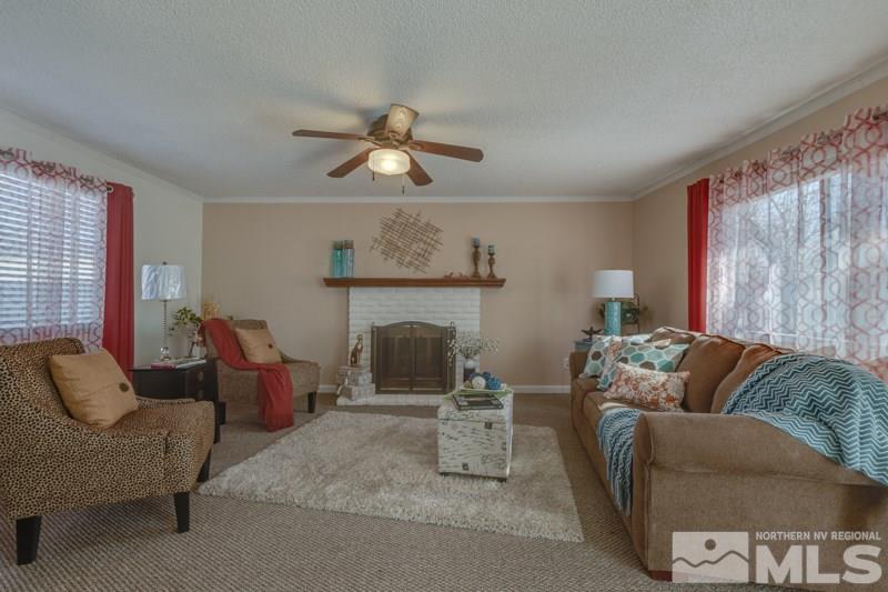 1830 Prior Road Reno, NV 89503 - Photo 4 of 16 a living room with furniture and a fireplace