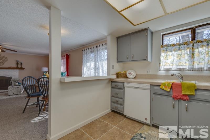 1830 Prior Road Reno, NV 89503 - Photo 5 of 16 a kitchen with sink cabinets and window