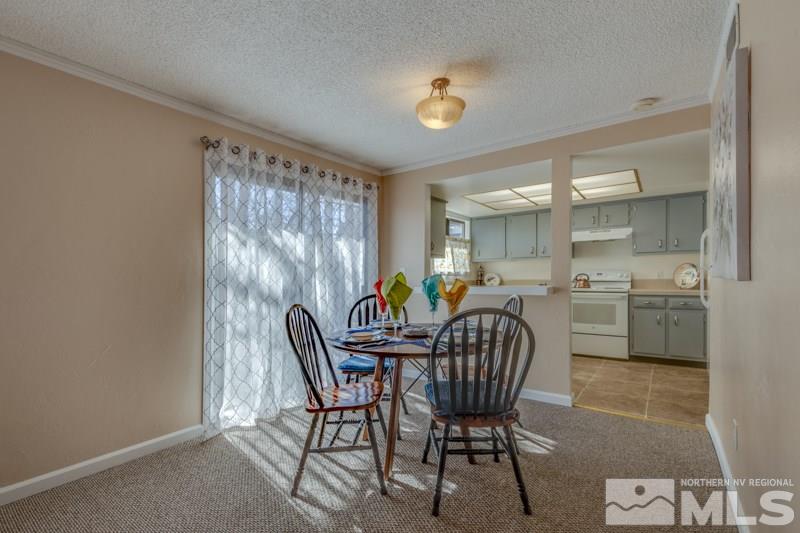 1830 Prior Road Reno, NV 89503 - Photo 7 of 16 a dining room with furniture and window