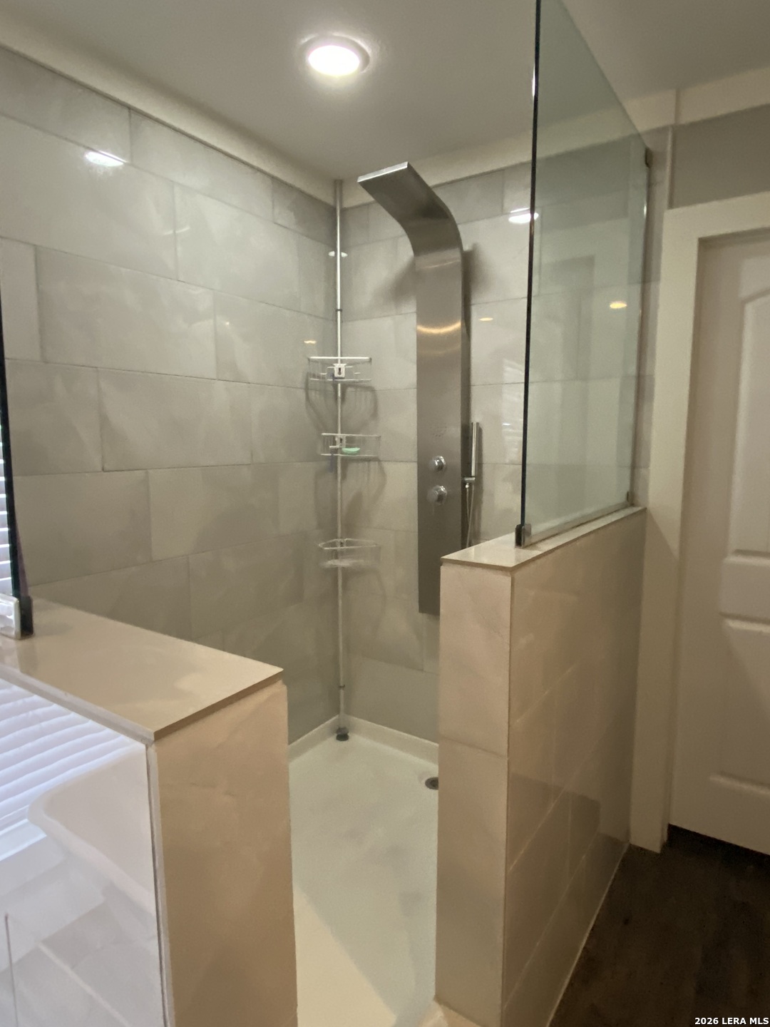 316 County Road 775 Devine, TX 78016 - Photo 2 of 10 a bathroom with a shower and a sink