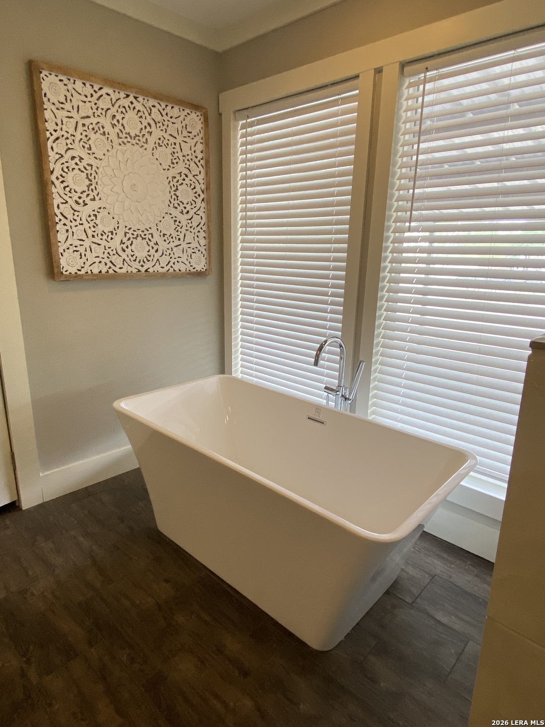 316 County Road 775 Devine, TX 78016 - Photo 3 of 10 a view of a bathtub in a room