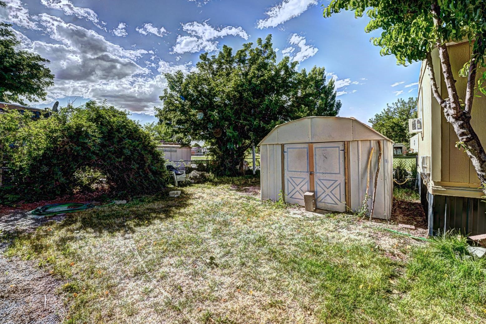 585-25 25 1/2 Road, Unit 72 Grand Junction, CO 81505 - Photo 19 of 21 a backyard of a house with lots of green space