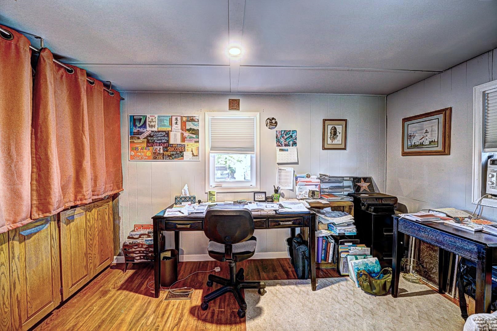 585-25 25 1/2 Road, Unit 72 Grand Junction, CO 81505 - Photo 7 of 21 a view of a workspace with furniture and a window