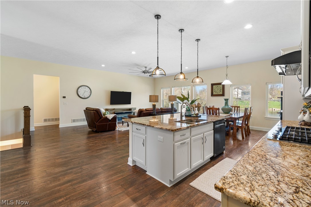 535 East Caston Road Green, OH 44685 - Photo 7 of 44 Amazing open kitchen with high end appliances, granite island, pendant lighting and 10 ft ceilings