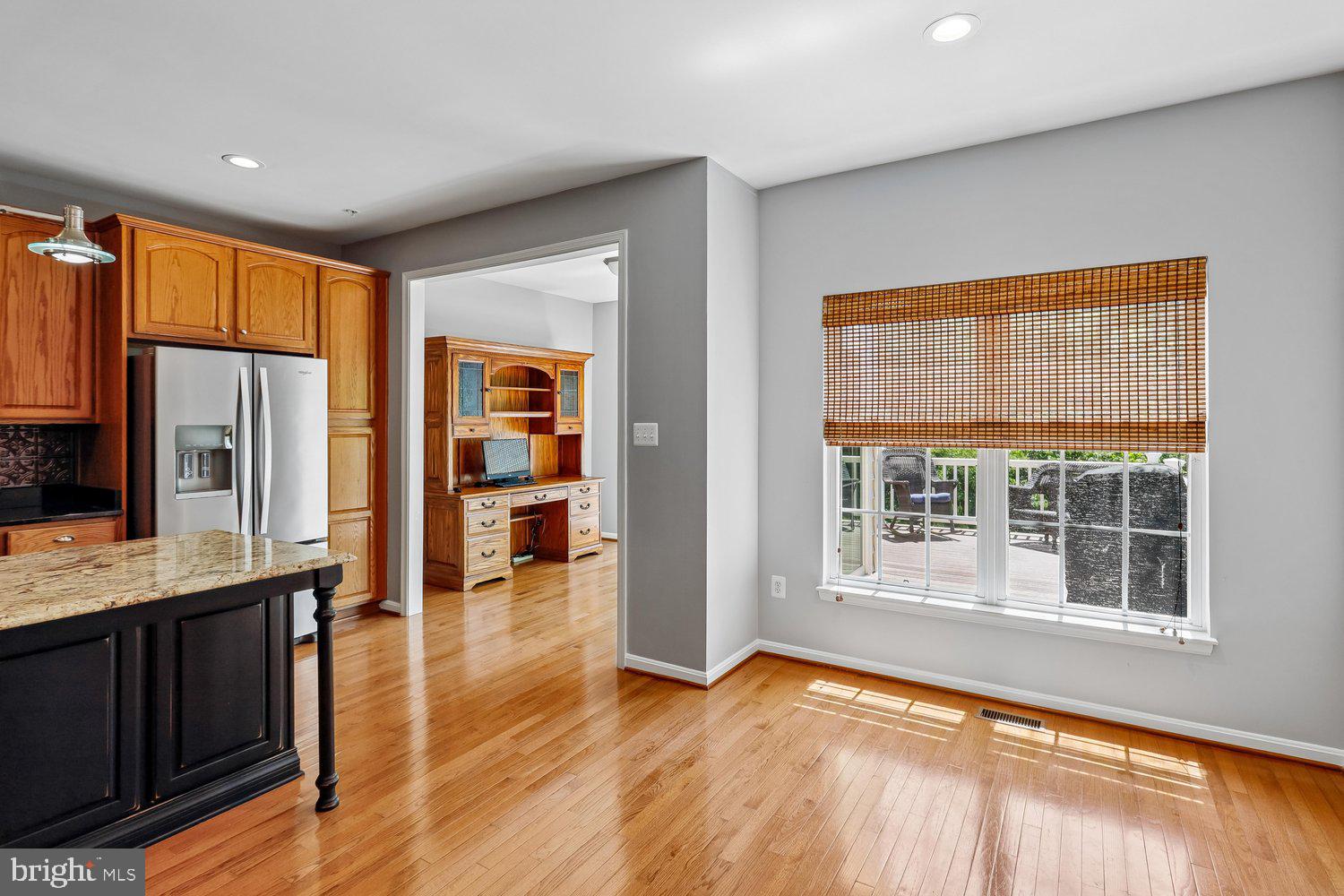 2396 Jostaberry Way Odenton, MD 21113 - Photo 17 of 55 a view of kitchen with furniture and wooden floor