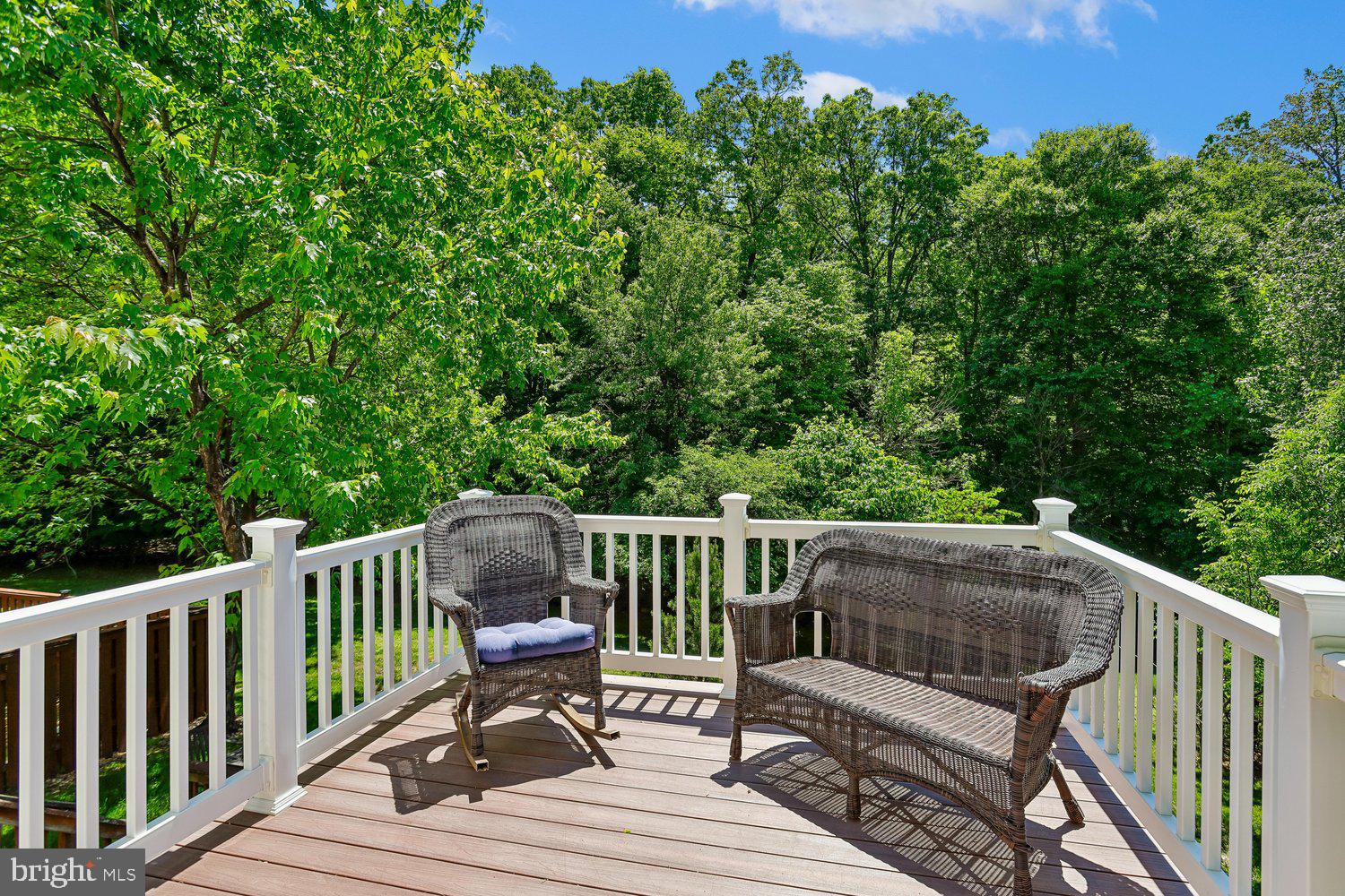 2396 Jostaberry Way Odenton, MD 21113 - Photo 23 of 55 a view of balcony with wooden floor and outdoor seating