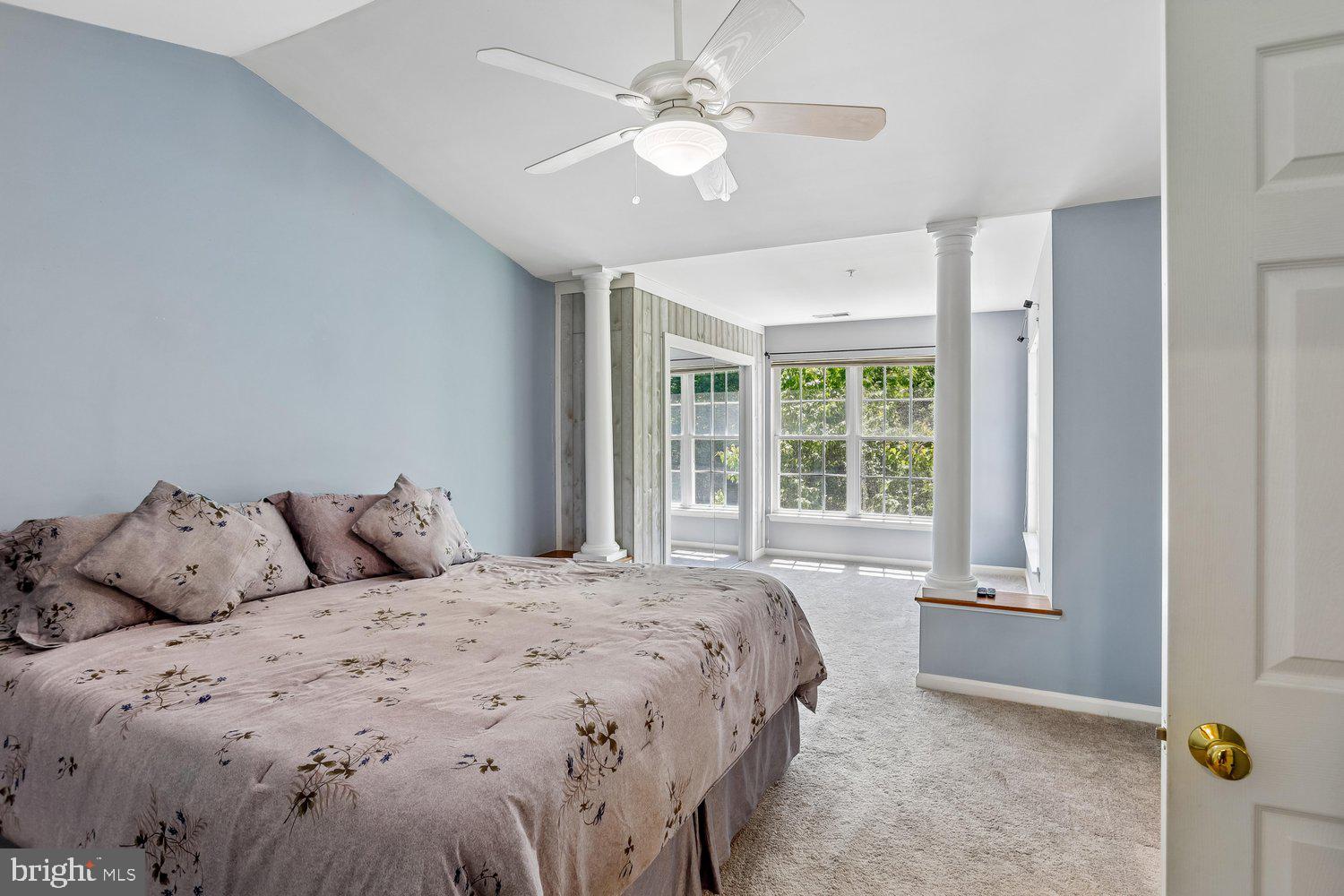 2396 Jostaberry Way Odenton, MD 21113 - Photo 25 of 55 a bedroom with a large bed and a window