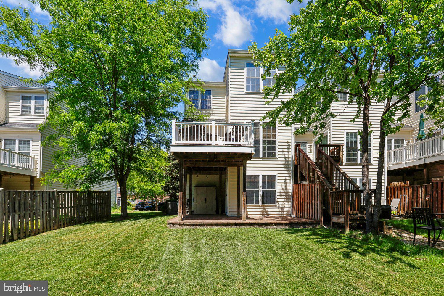 2396 Jostaberry Way Odenton, MD 21113 - Photo 3 of 55 a front view of a house with a garden