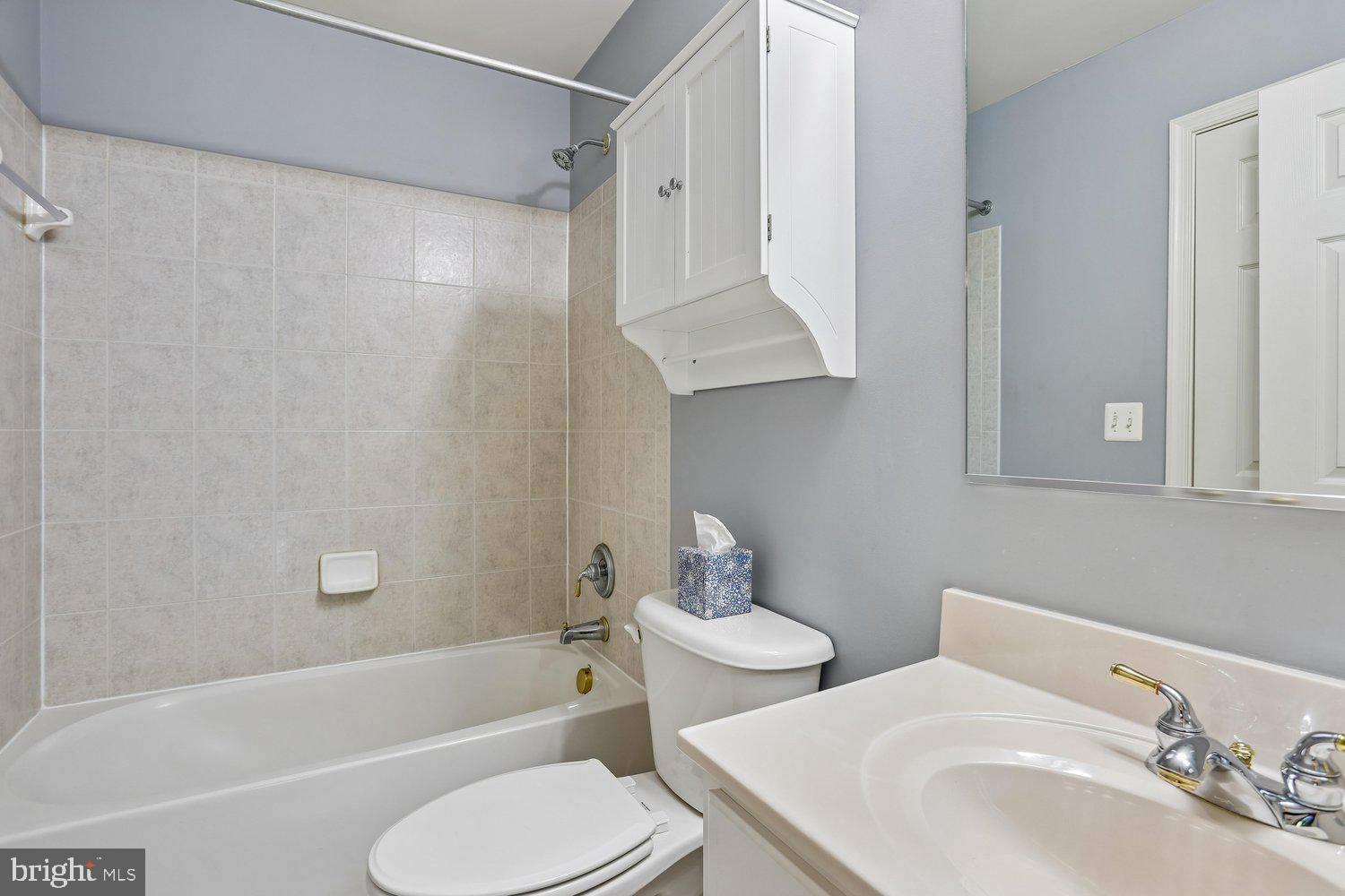 2396 Jostaberry Way Odenton, MD 21113 - Photo 32 of 55 a bathroom with a sink toilet and shower