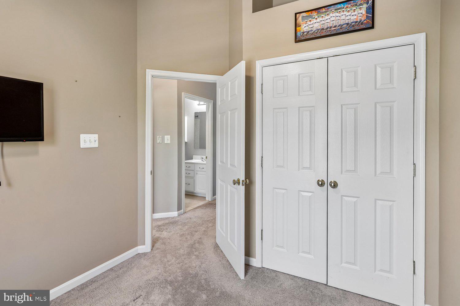 2396 Jostaberry Way Odenton, MD 21113 - Photo 37 of 55 a view of a hallway with wooden floor