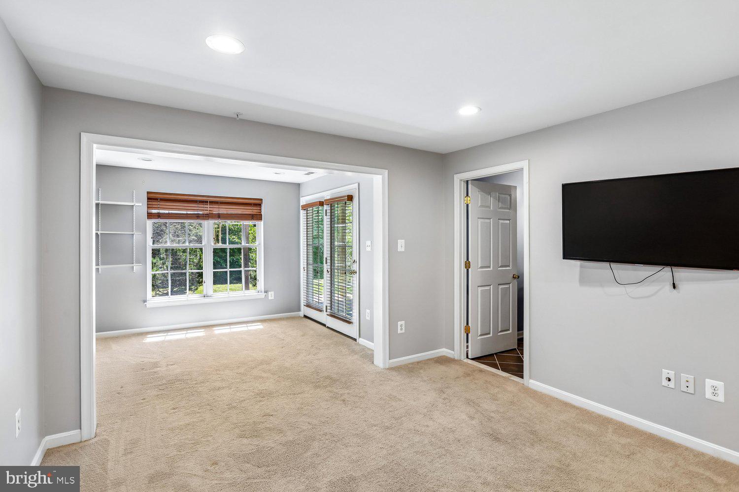 2396 Jostaberry Way Odenton, MD 21113 - Photo 43 of 55 a view of a livingroom with a flat screen tv