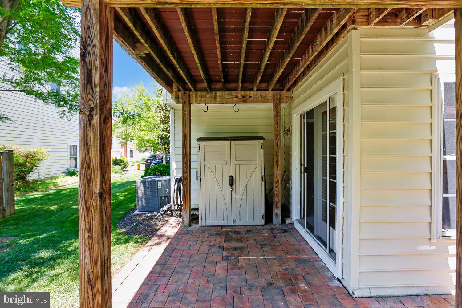 2396 Jostaberry Way Odenton, MD 21113 - Photo 6 of 55 a view of a porch with wooden floor and outdoor space