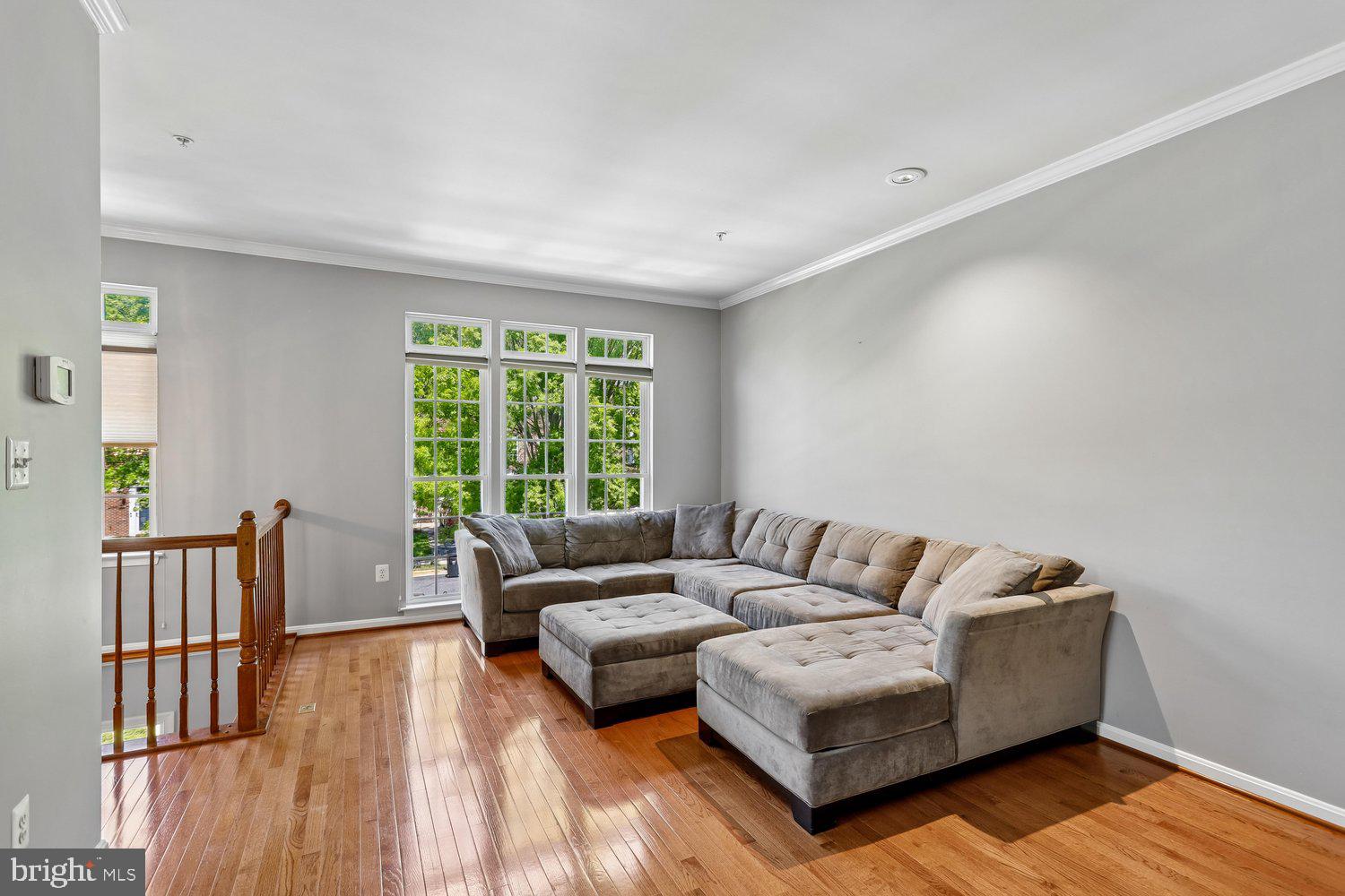 2396 Jostaberry Way Odenton, MD 21113 - Photo 7 of 55 a living room with furniture and a large window