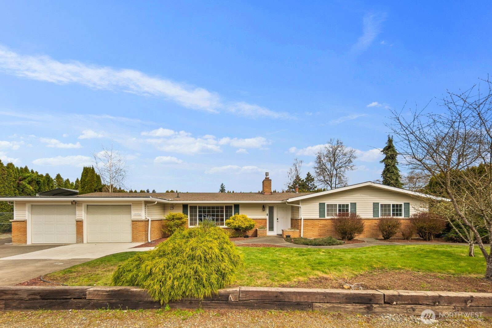 10400 Southeast 194th Place Renton, WA 98055 - Photo 1 of 25 a front view of a house with a yard