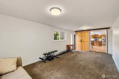 a view of a livingroom with a furniture and a window