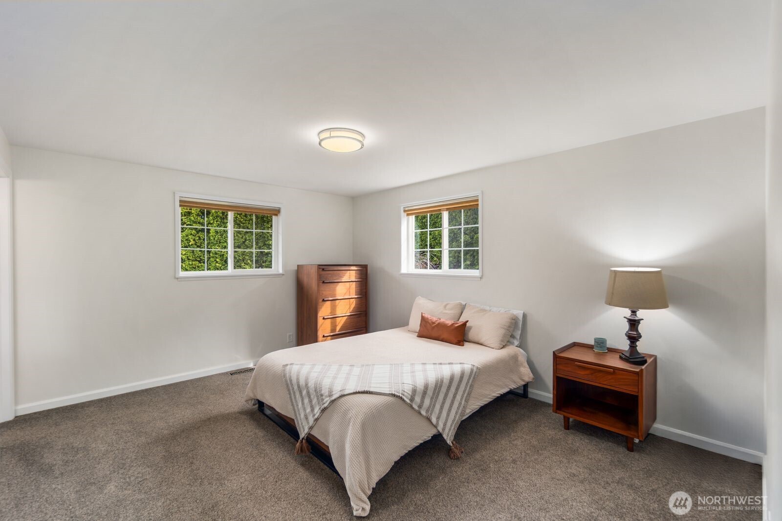 10400 Southeast 194th Place Renton, WA 98055 - Photo 12 of 25 a bedroom with a bed and a window