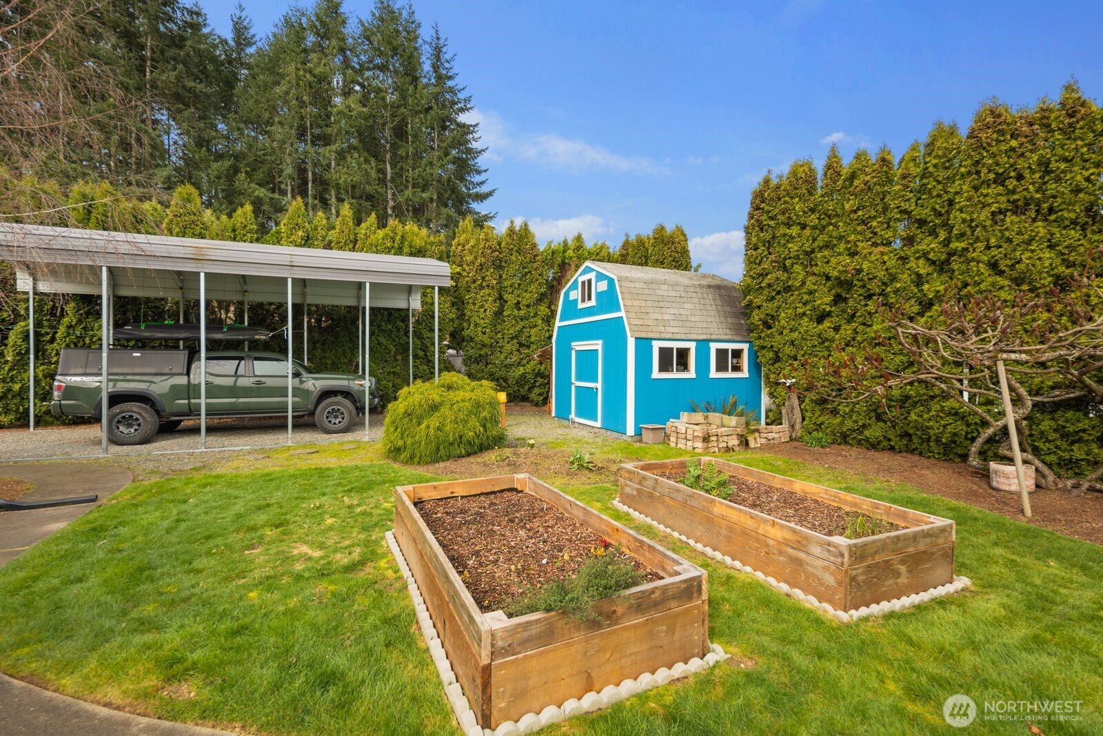 10400 Southeast 194th Place Renton, WA 98055 - Photo 18 of 25 a view of a house with backyard and porch