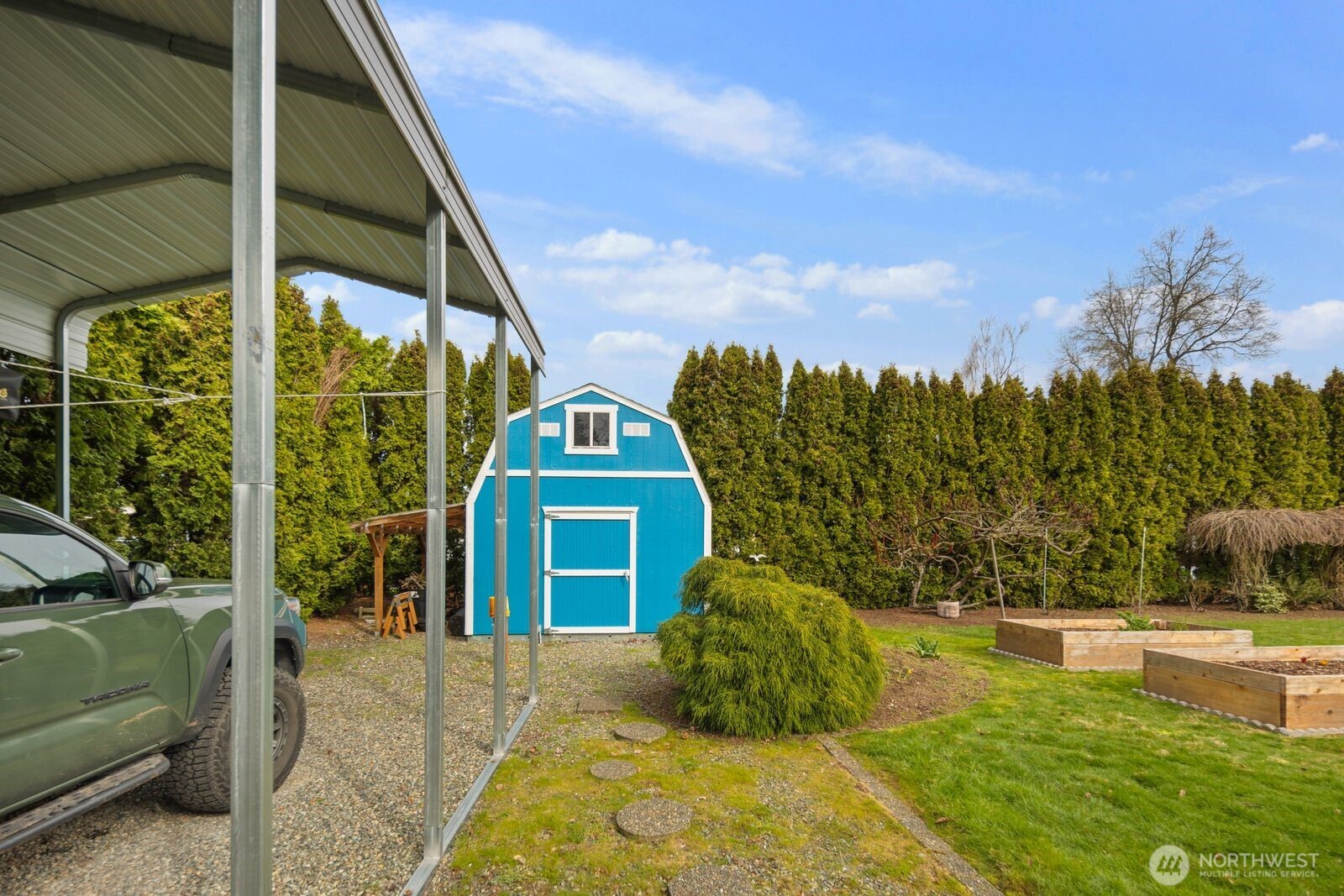 10400 Southeast 194th Place Renton, WA 98055 - Photo 21 of 25 a view of a garden with an outdoor seating