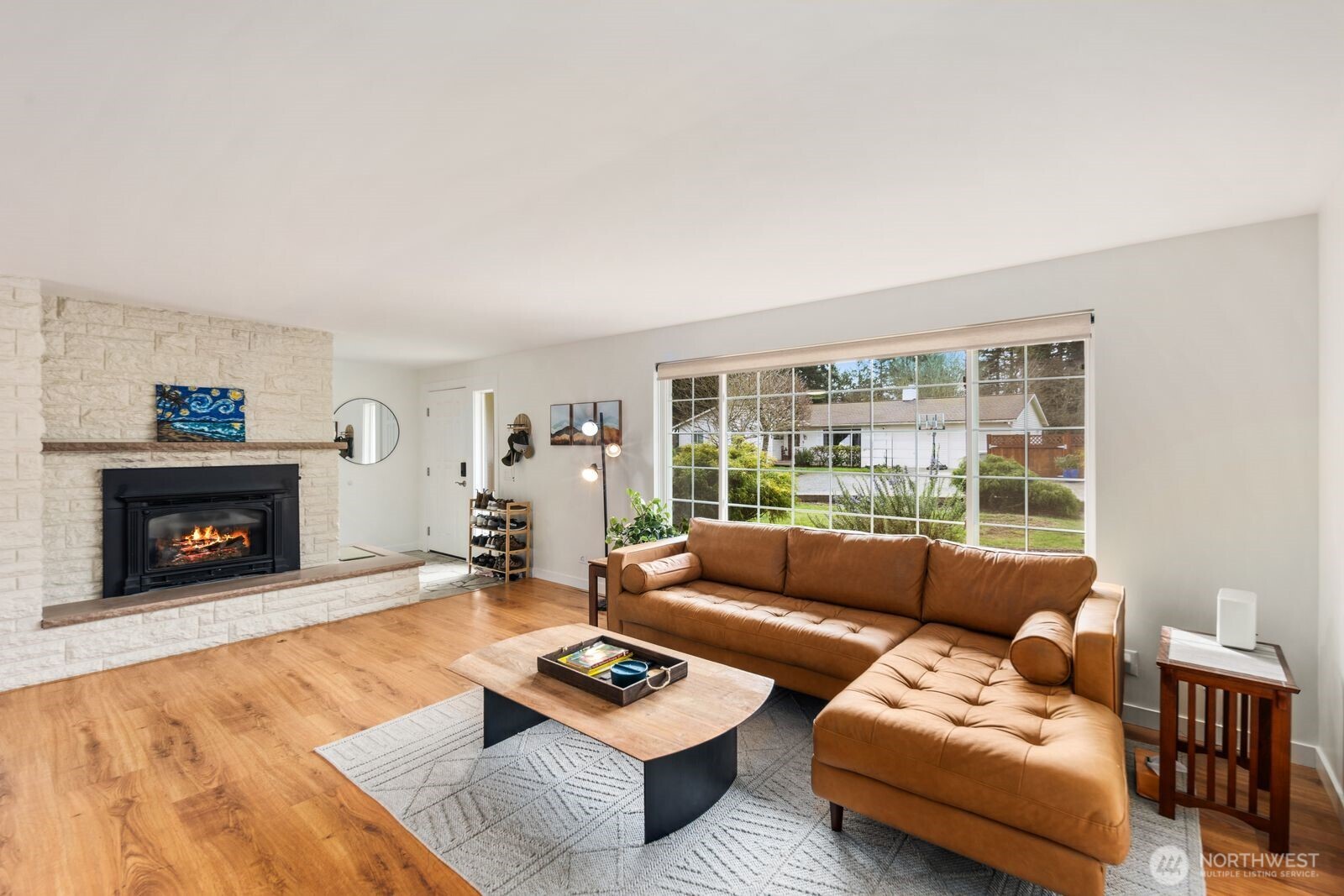 10400 Southeast 194th Place Renton, WA 98055 - Photo 4 of 25 a living room with furniture and a fireplace
