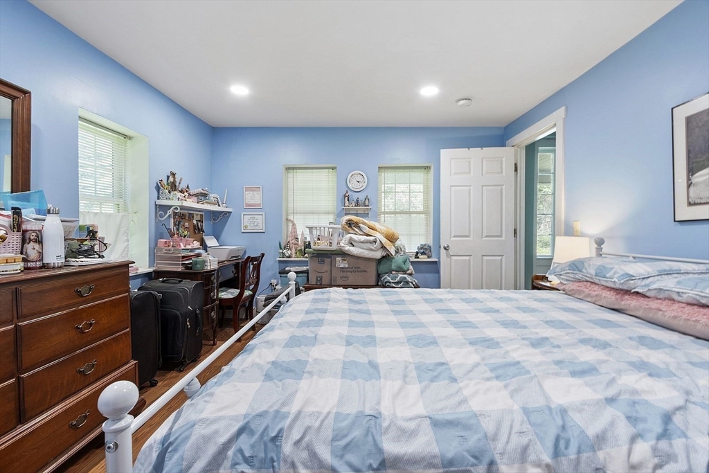 610 South Main Street Orange, MA 01364 - Photo 11 of 38 a bedroom with a bed and furniture