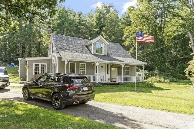 a car parked in front of a house