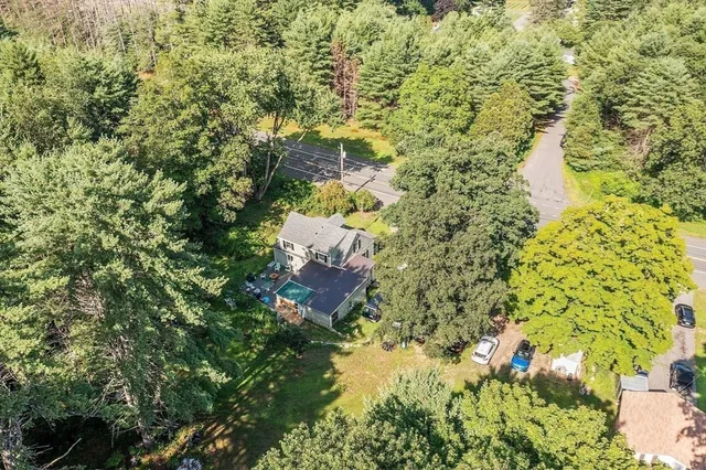 a view of a street with houses on both side