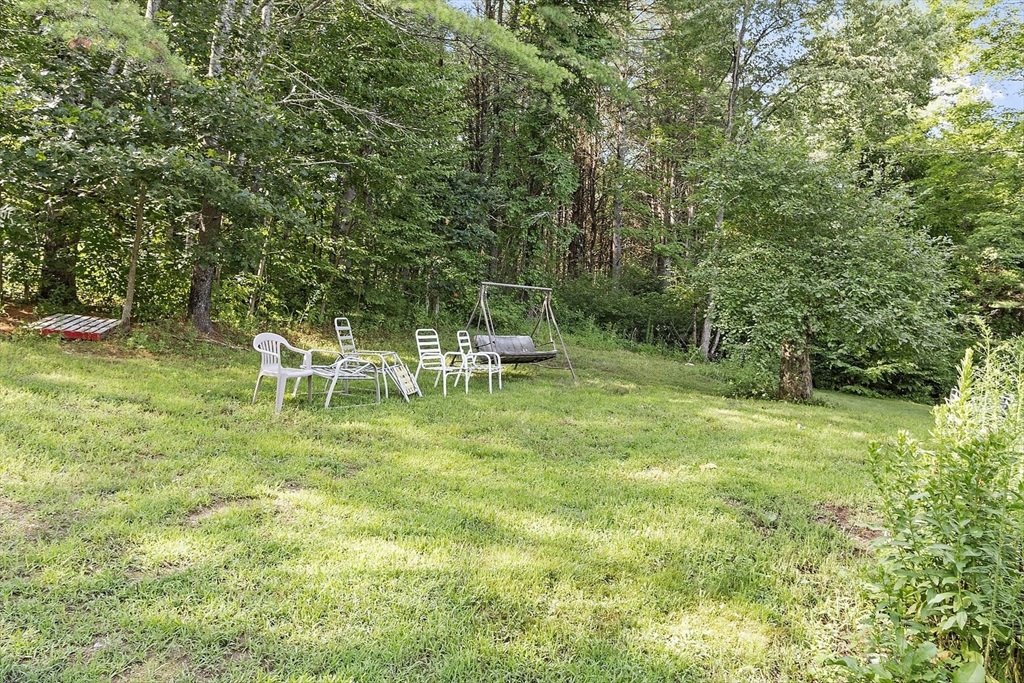 610 South Main Street Orange, MA 01364 - Photo 34 of 38 a view of yard with green space and seating area