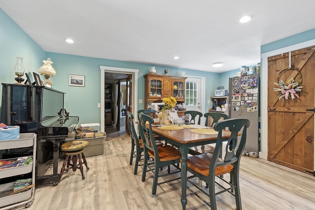 610 South Main Street Orange, MA 01364 - Photo 5 of 38 a dining room with furniture and wooden floor