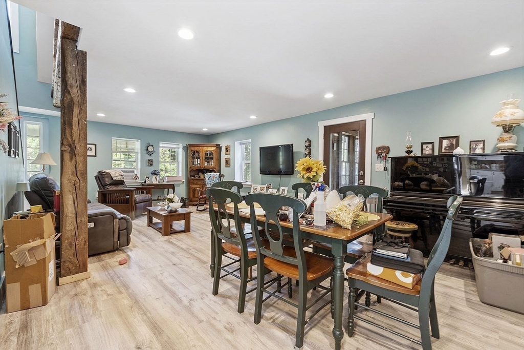 610 South Main Street Orange, MA 01364 - Photo 7 of 38 a living room with furniture kitchen view and a flat screen tv