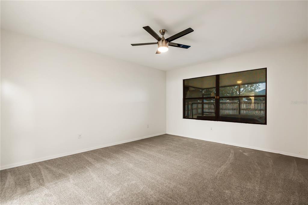 19214 Briercrest Trail Orlando, FL 32833 - Photo 20 of 47 a view of an empty room with a window