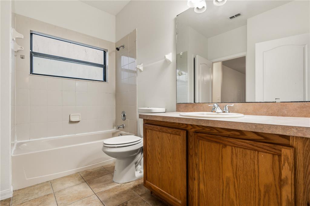 19214 Briercrest Trail Orlando, FL 32833 - Photo 27 of 47 a bathroom with a sink a toilet and shower