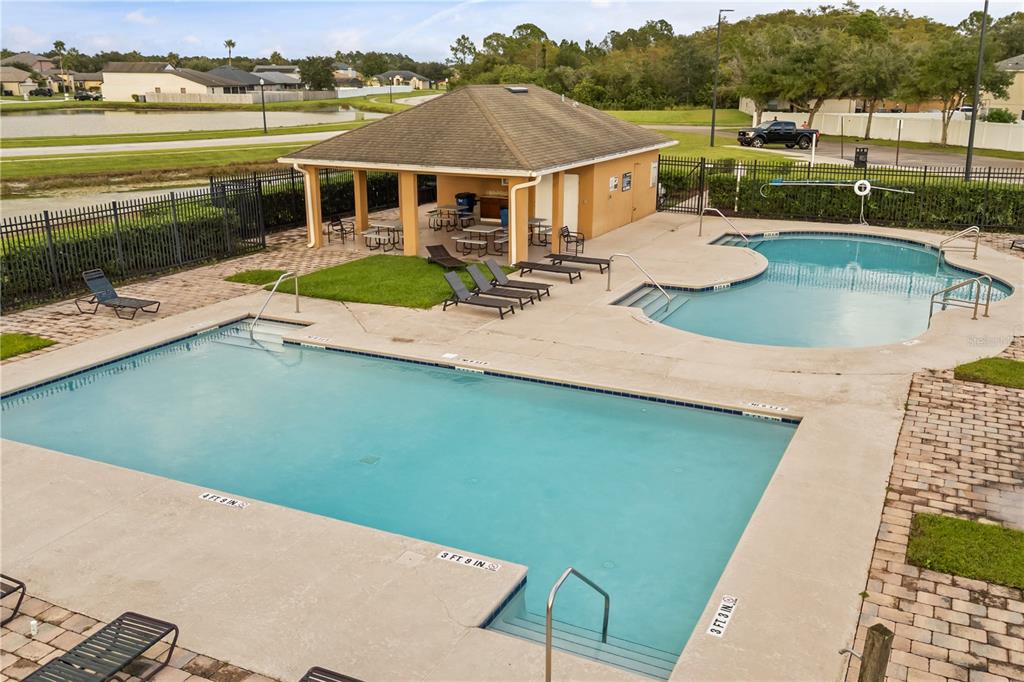 19214 Briercrest Trail Orlando, FL 32833 - Photo 46 of 47 a view of a house with pool and a chairs