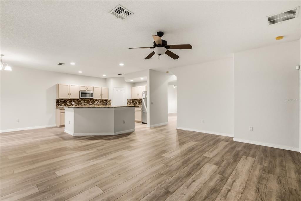 19214 Briercrest Trail Orlando, FL 32833 - Photo 8 of 47 a view of a kitchen with a sink and wooden floor