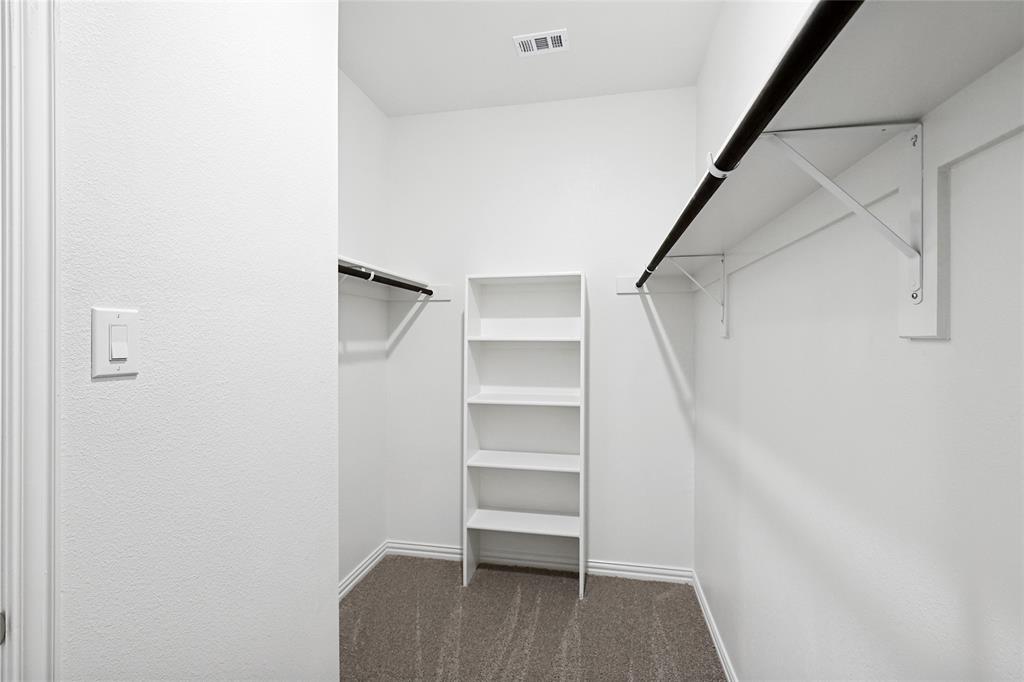 3900 Coco Lane Sherman, TX 75090 - Photo 16 of 40 Spacious closet featuring dark colored carpet