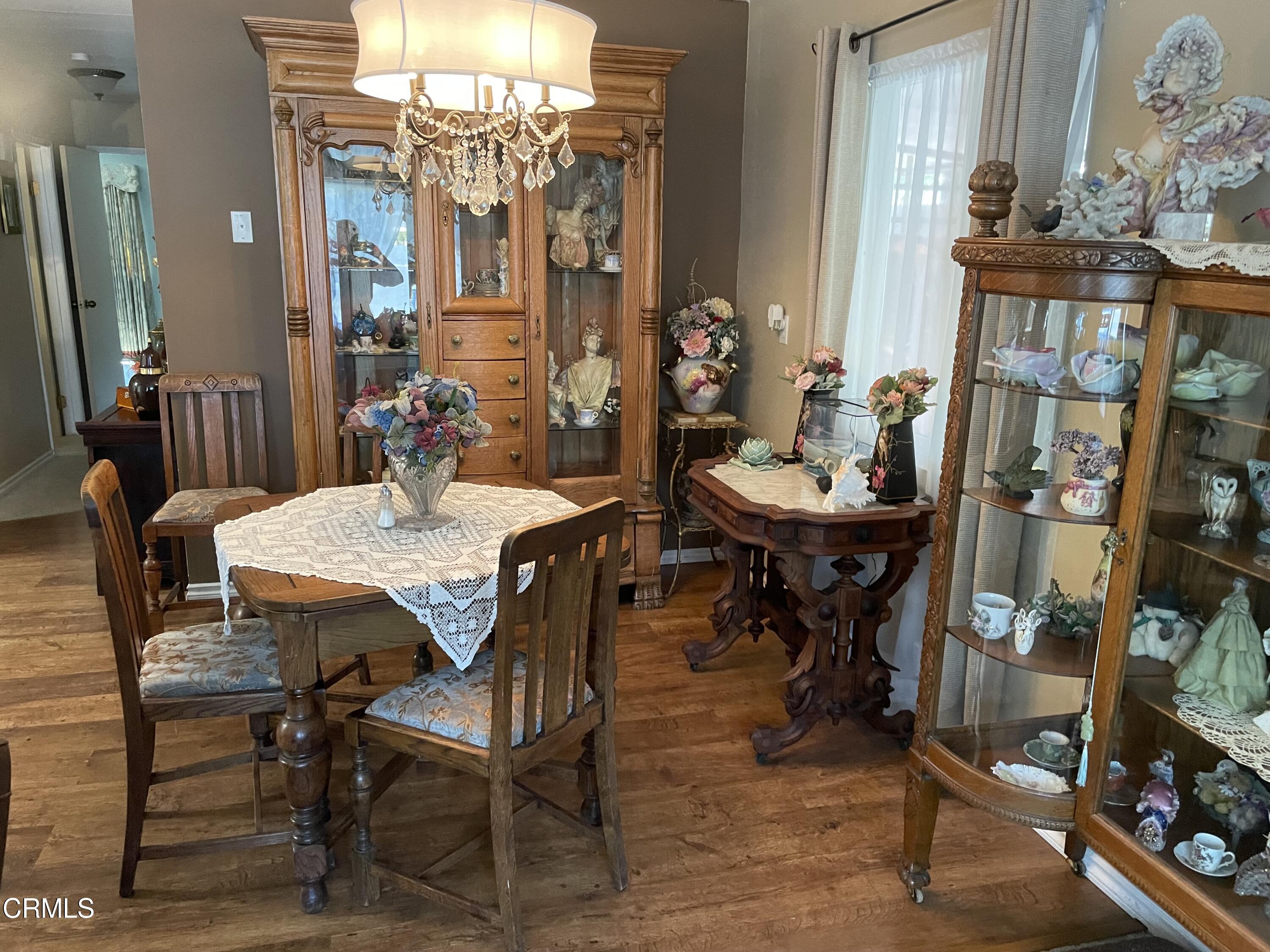 1225 South Rice Road, Unit 67 Ojai, CA 93023 - Photo 8 of 28 a view of a dining room with furniture and a chandelier
