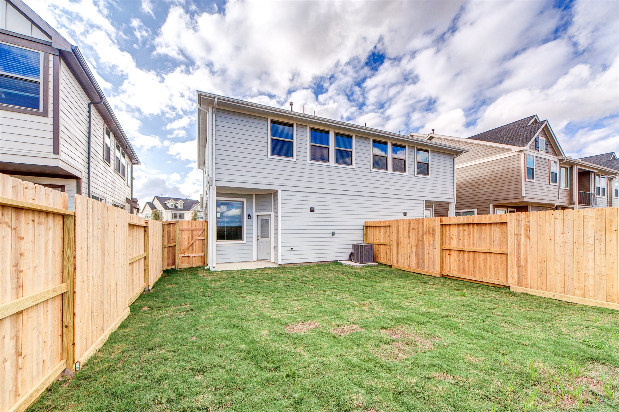 5131 Prairie Terrace Lane Fulshear, TX 77441 - Photo 20 of 21 a view of a house with a yard