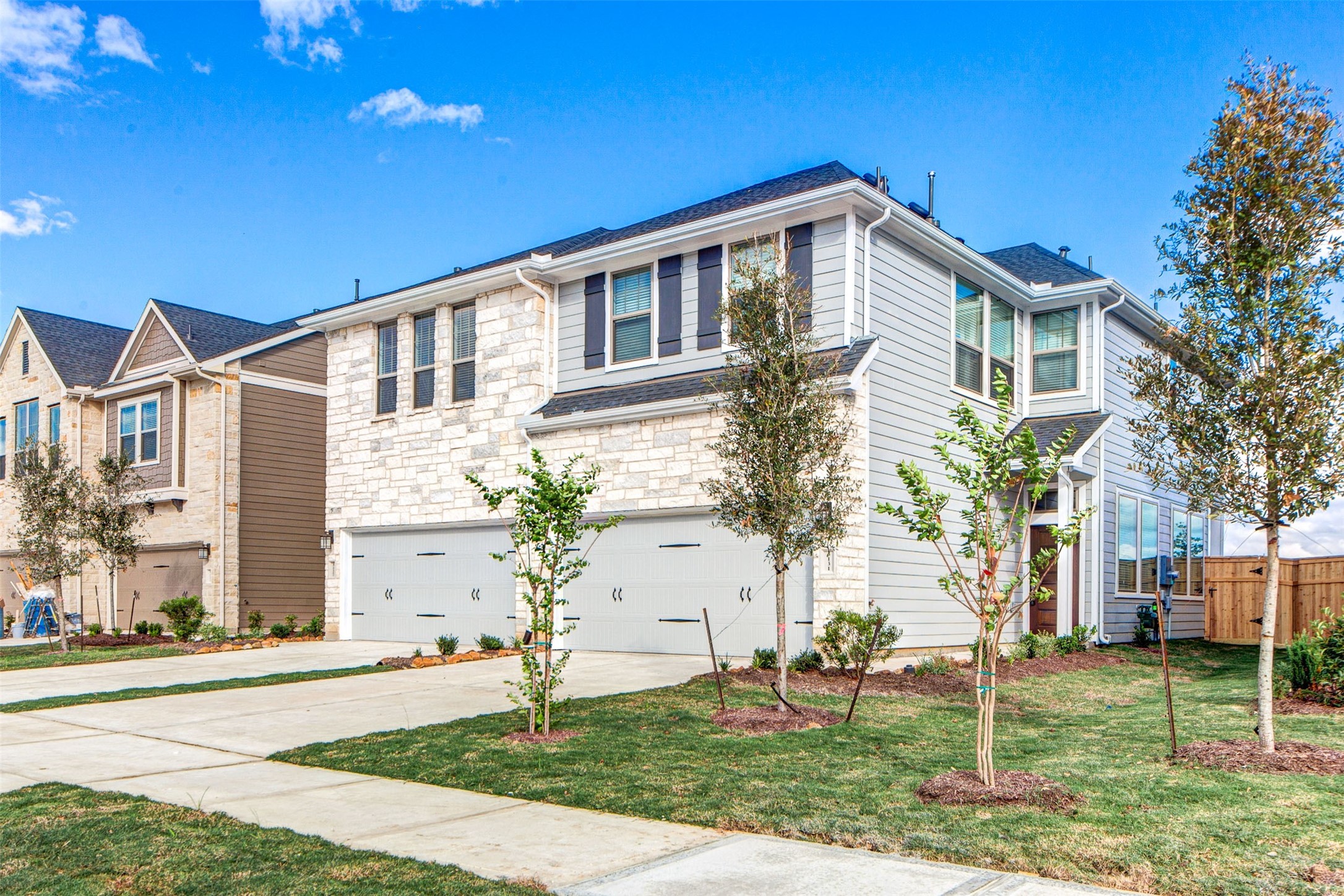 5131 Prairie Terrace Lane Fulshear, TX 77441 - Photo 2 of 21 a front view of a house with a yard