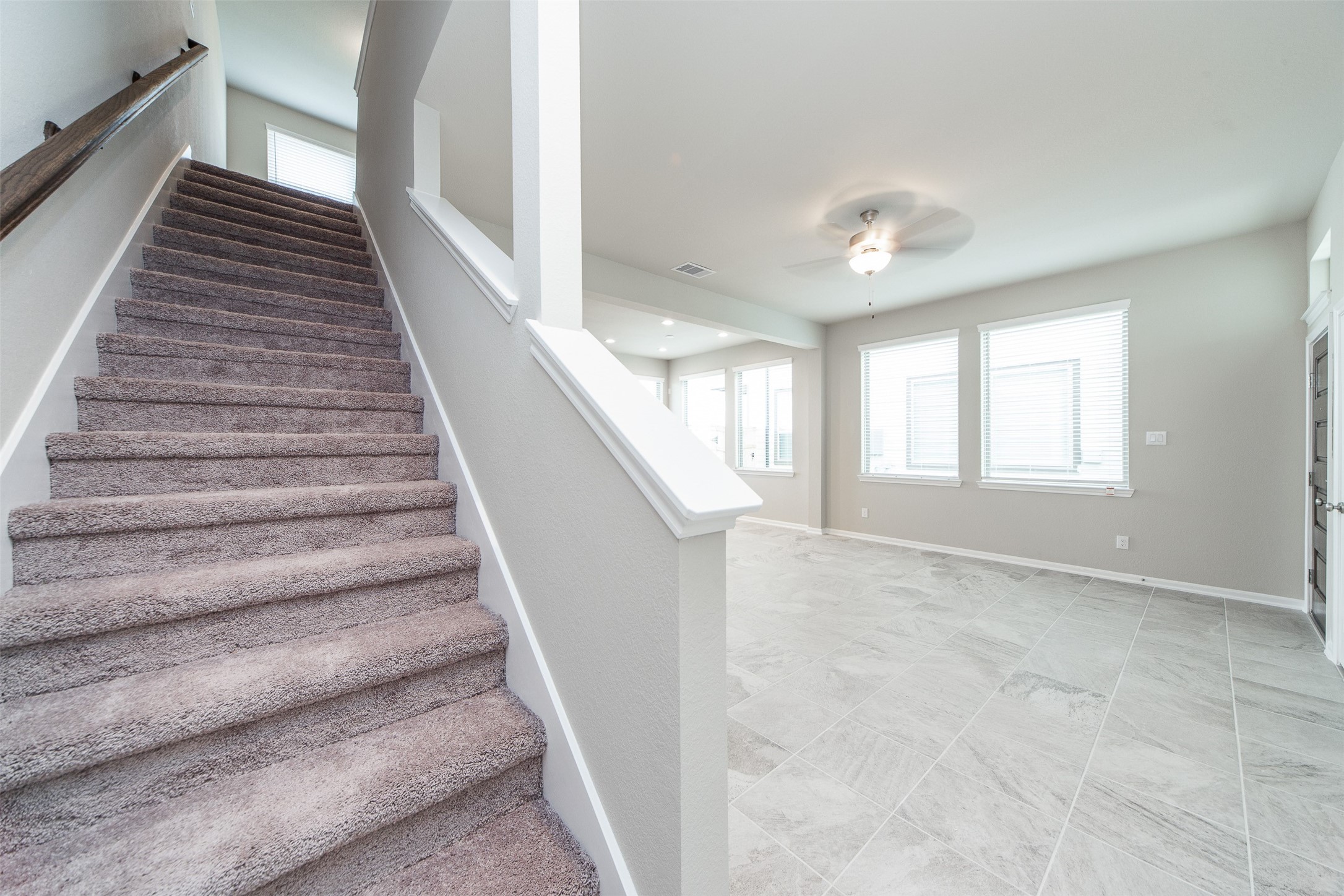 5131 Prairie Terrace Lane Fulshear, TX 77441 - Photo 10 of 21 a view of entryway and hall with wooden floor