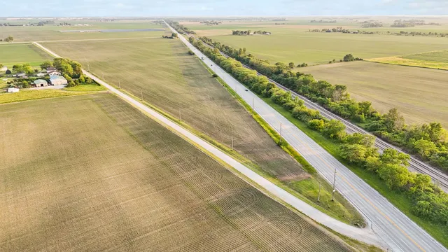 a view of an ocean and a houses