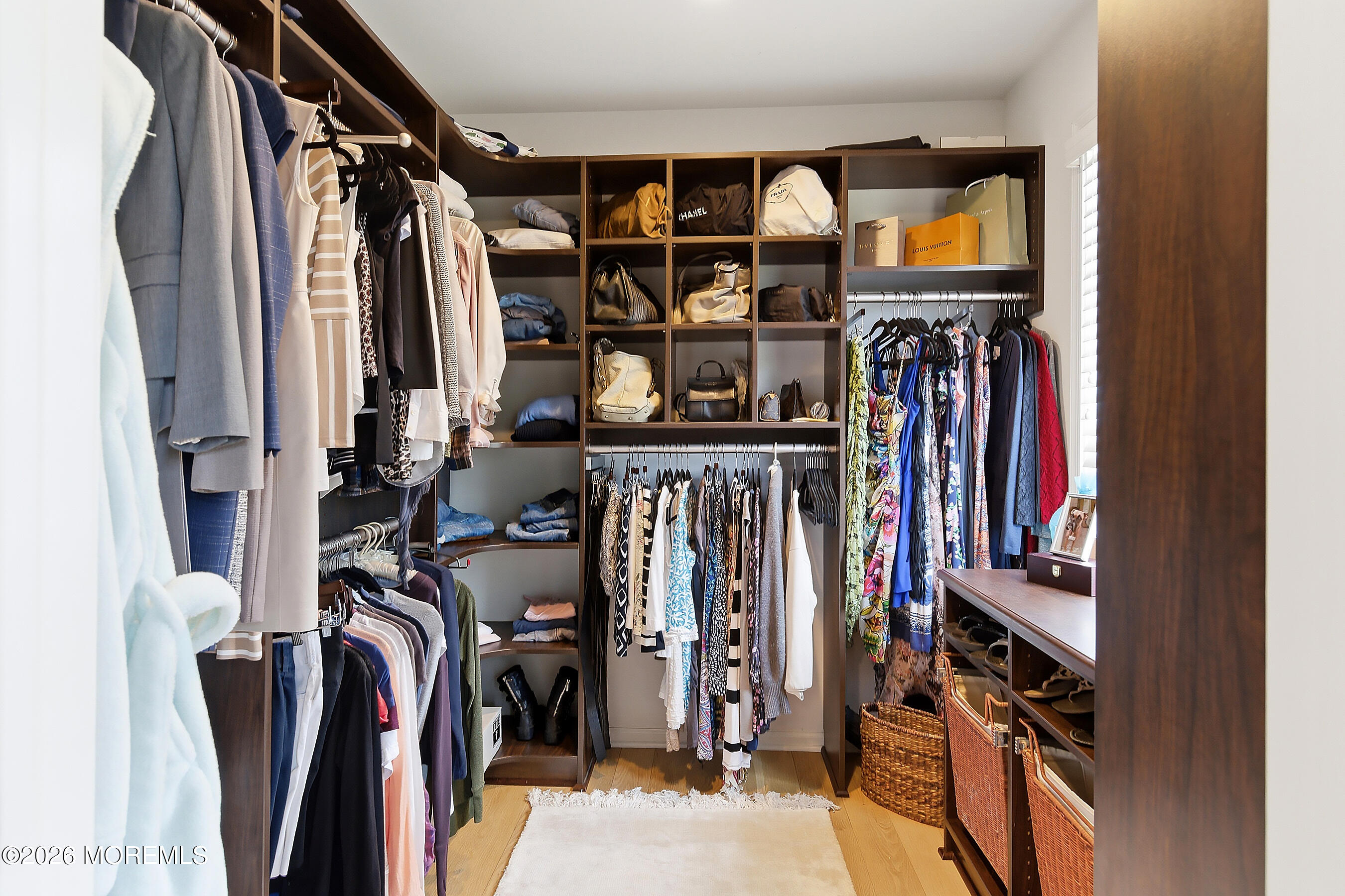 924 Ocean Road Point Pleasant, NJ 08742 - Photo 25 of 56 a view of walk in closet with clothes and shoes