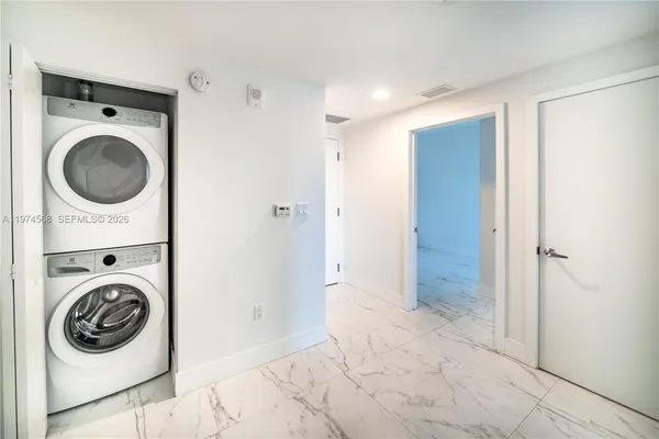 a view of living room and kitchen