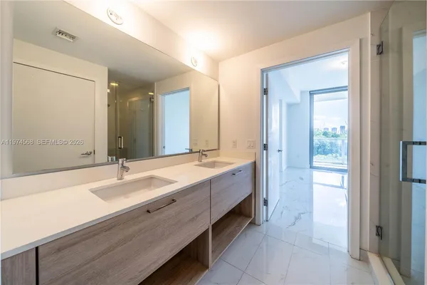 a bathroom with a toilet and a sink