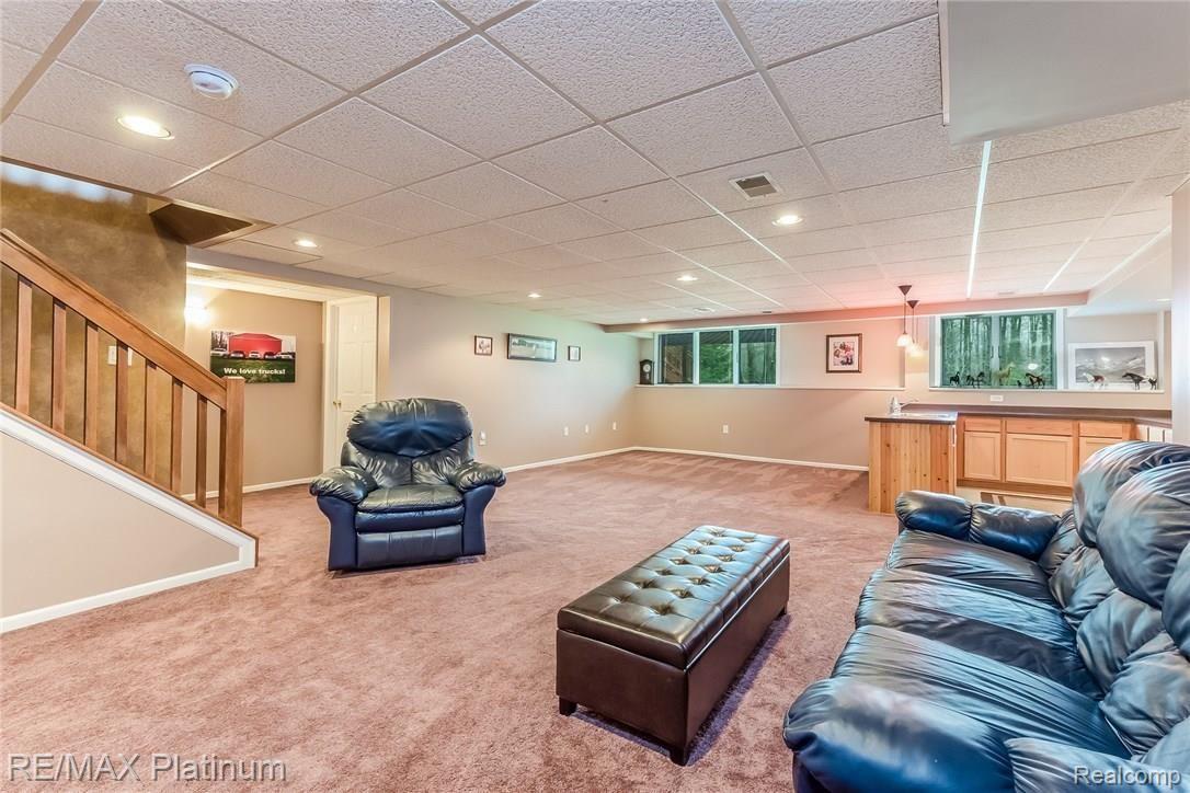 4558 North Latson Road Howell, MI 48855 - Photo 22 of 46 Finished Lower Level with Daylight Windows and Lots of Room