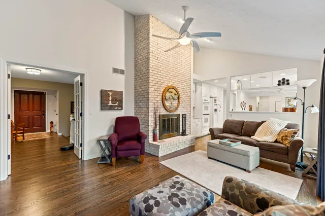a large kitchen with stainless steel appliances lots of counter space sink and cabinets